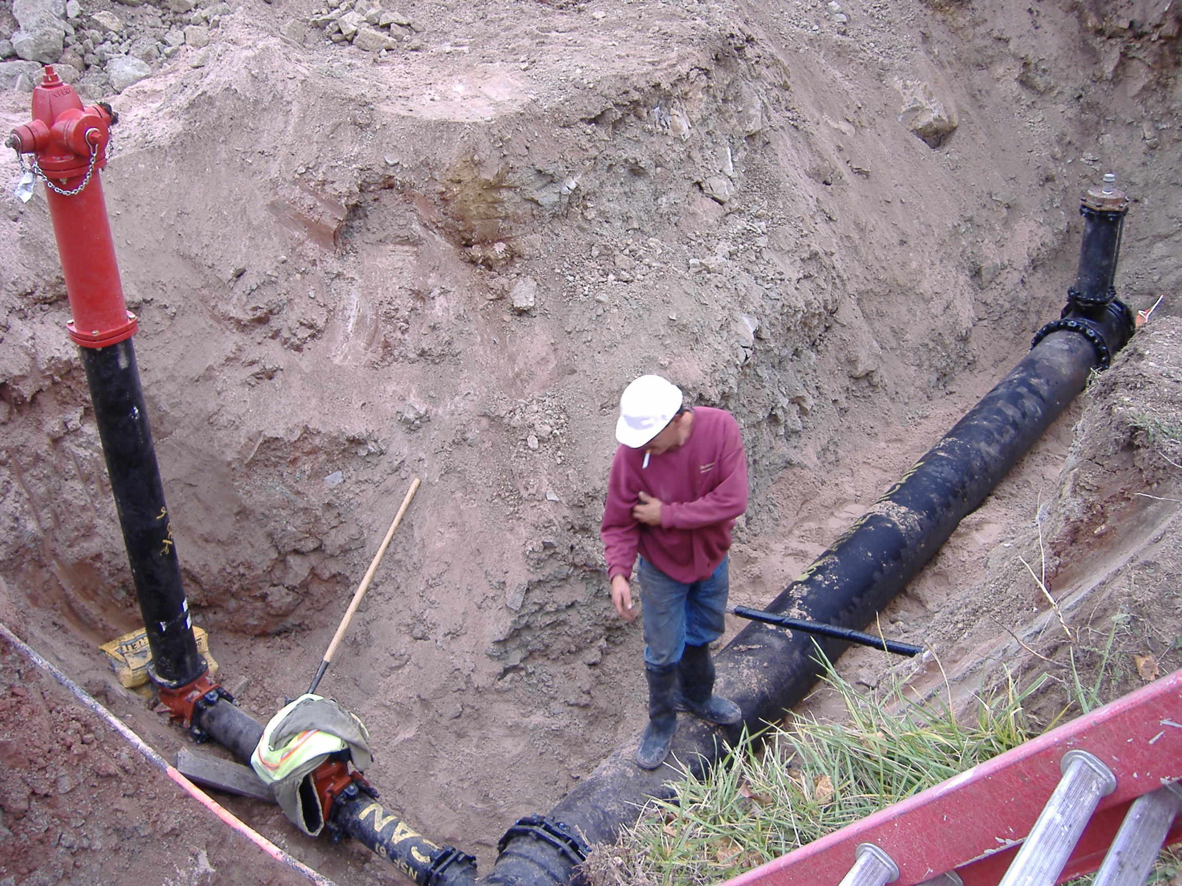 Maverick Construction Inc. excavation contractor builder water and sewer Northern Michigan